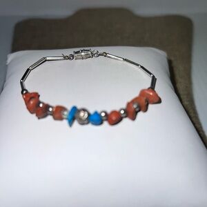 Elegant Silver Bracelet with Coral and Blue Beads